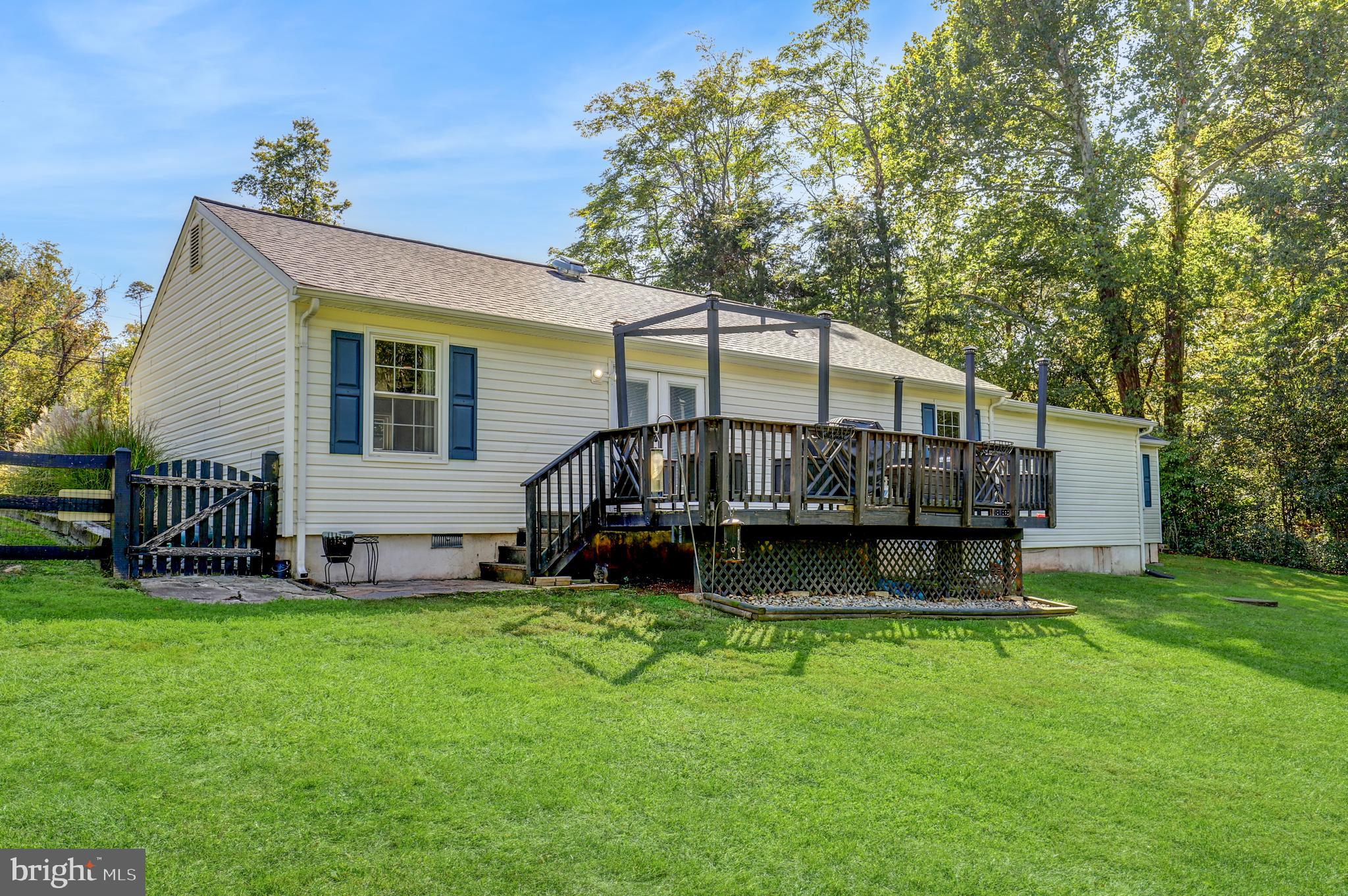9422 Brentsville Road Manassas, VA 20112 - Photo 28 of 37 a view of a house with a yard porch and sitting area