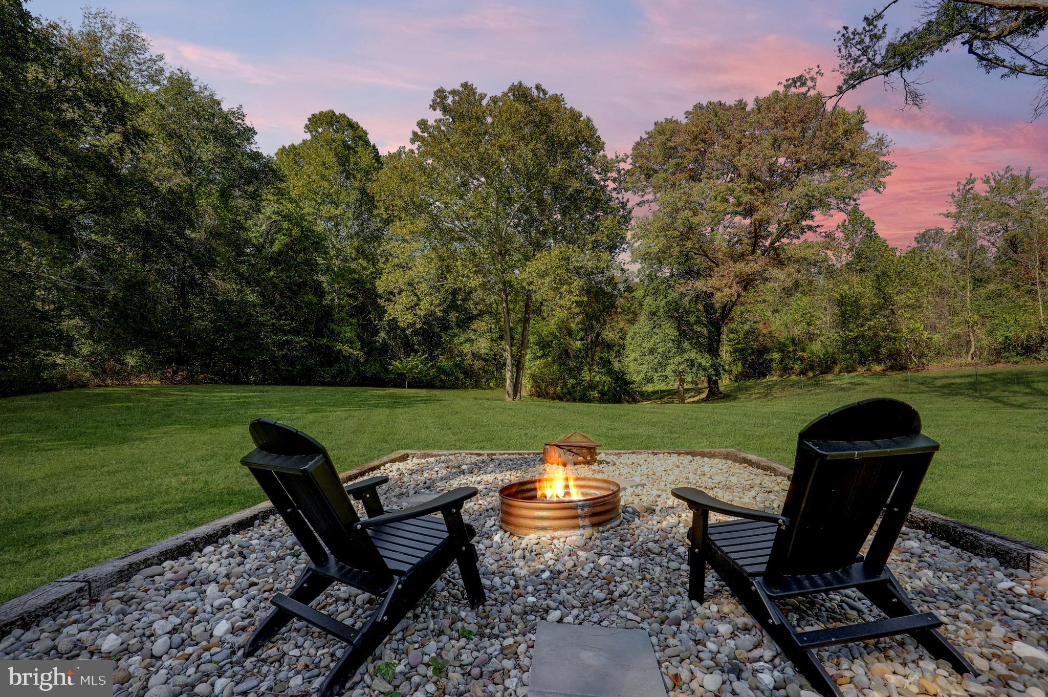 9422 Brentsville Road Manassas, VA 20112 - Photo 37 of 37 a view of a lake with table and chairs