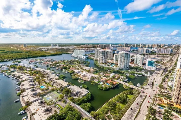 a view of a city with an ocean