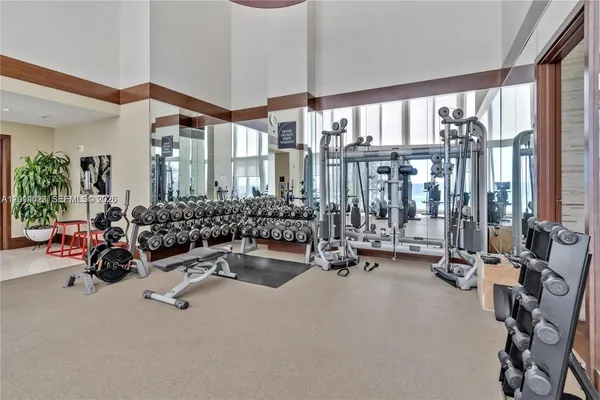 a view of a room with gym equipment