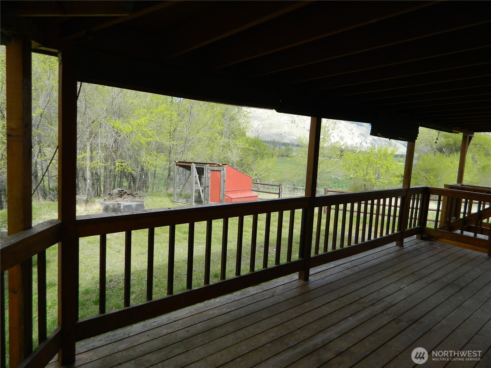 2127 Sinlahekin Road Loomis, WA 98827 - Photo 12 of 24 a view of balcony with wooden floor