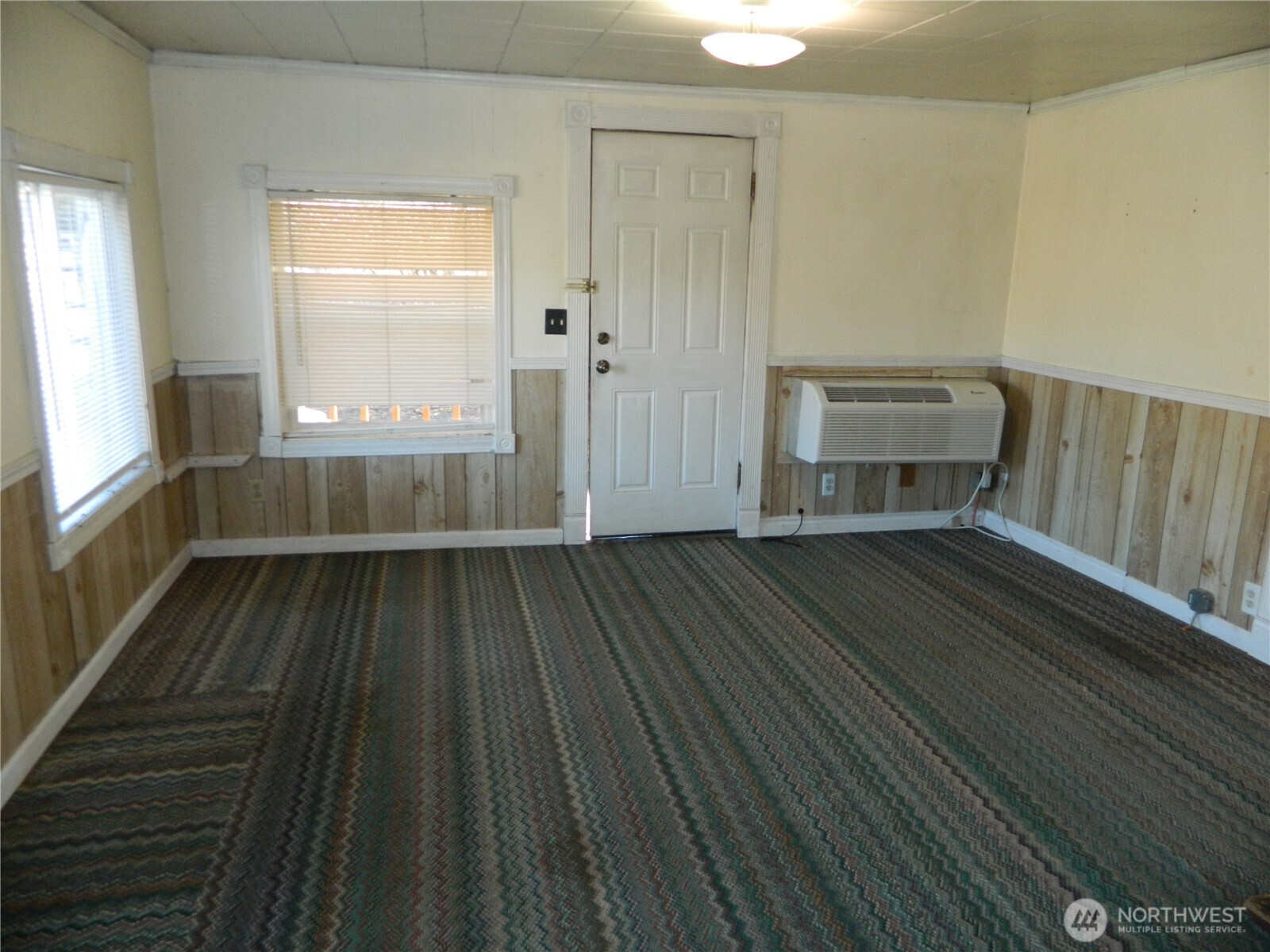 2127 Sinlahekin Road Loomis, WA 98827 - Photo 14 of 16 a view of wooden floor in a room