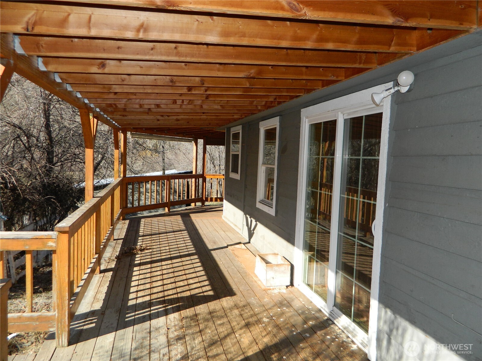 2127 Sinlahekin Road Loomis, WA 98827 - Photo 3 of 16 a view of balcony with wooden floor
