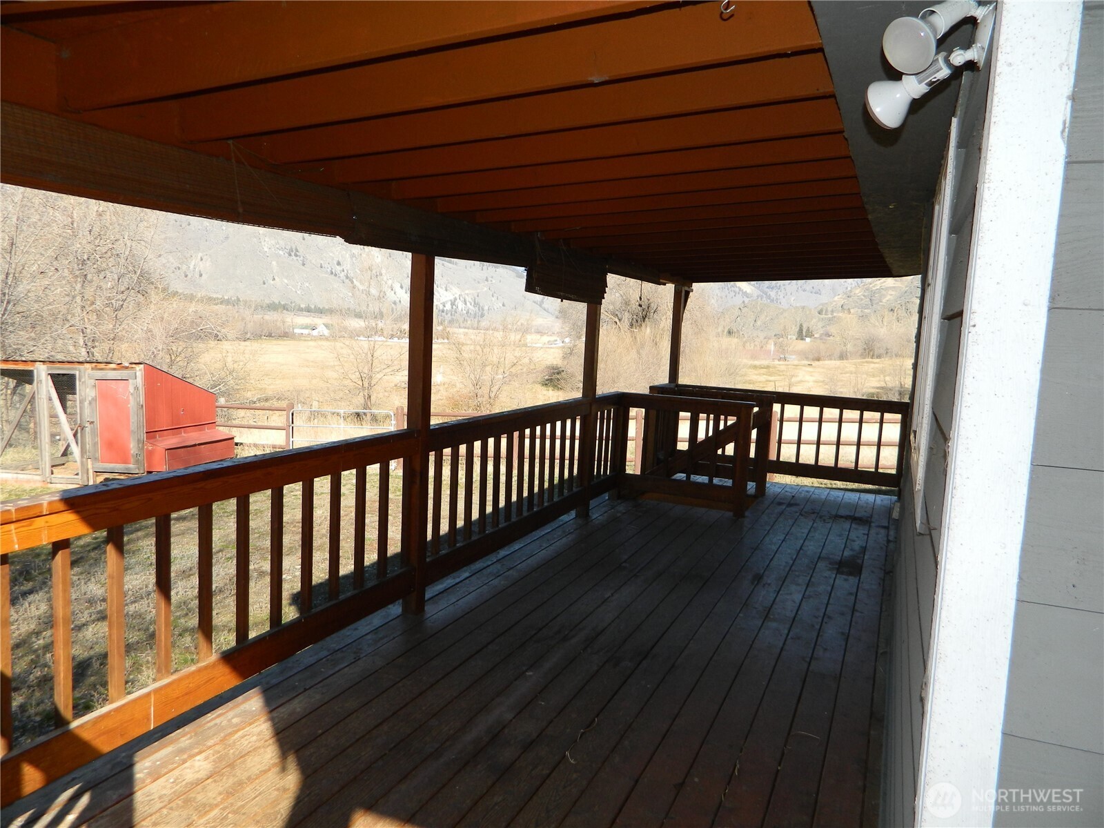 2127 Sinlahekin Road Loomis, WA 98827 - Photo 4 of 16 a view of deck with a patio