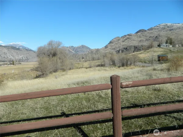 a view of a yard with an ocean view