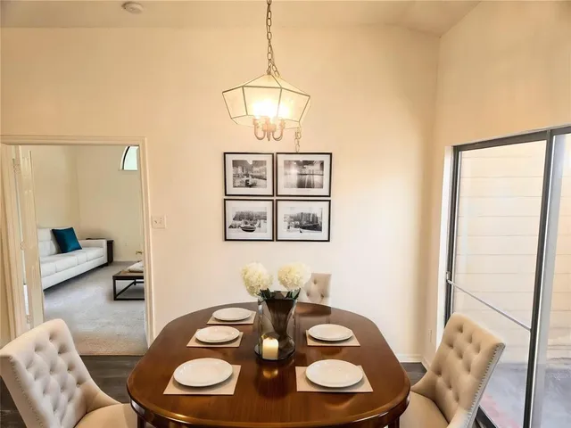 a view of a dining room with furniture