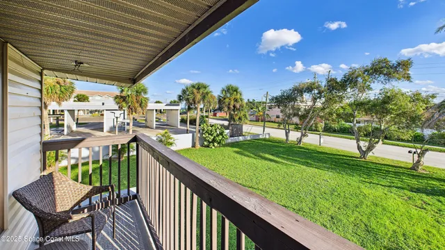 a view of a porch with a backyard