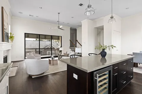 a white bath tub sitting in a bathroom next to a window