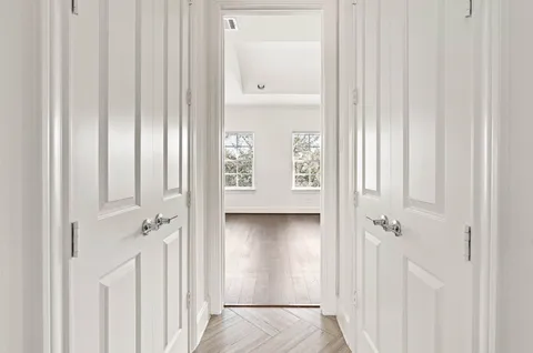 a view of a room with racks on the wall