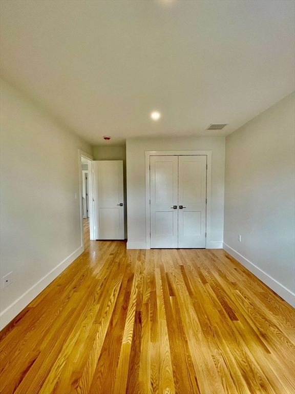 75 Neponset Street, Unit 5 Canton, MA 02021 - Photo 12 of 27 a view of wooden floor