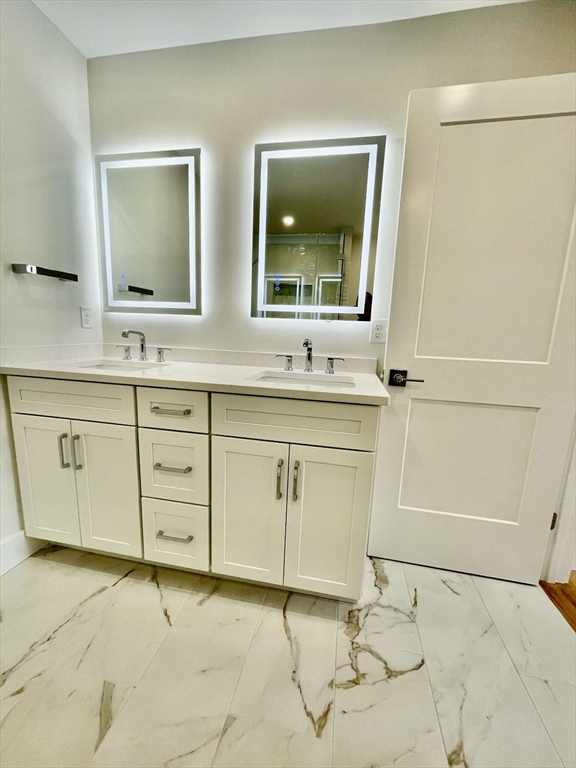 75 Neponset Street, Unit 5 Canton, MA 02021 - Photo 13 of 27 a bathroom with a sink and a mirror