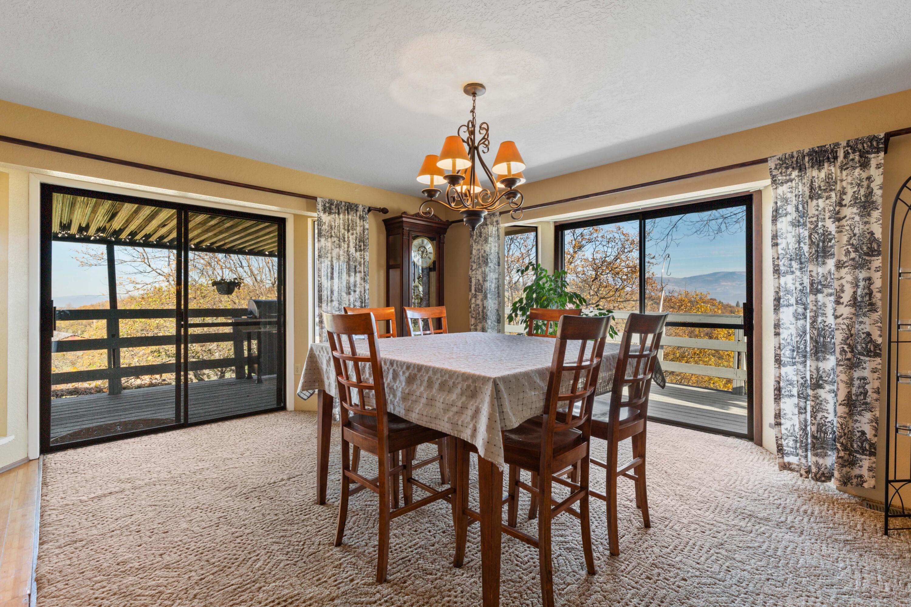 4351 Pioneer Road Medford, OR 97501 - Photo 26 of 55 Formal Dining Room area with access to Upper Level Deck with North and East Valley Views