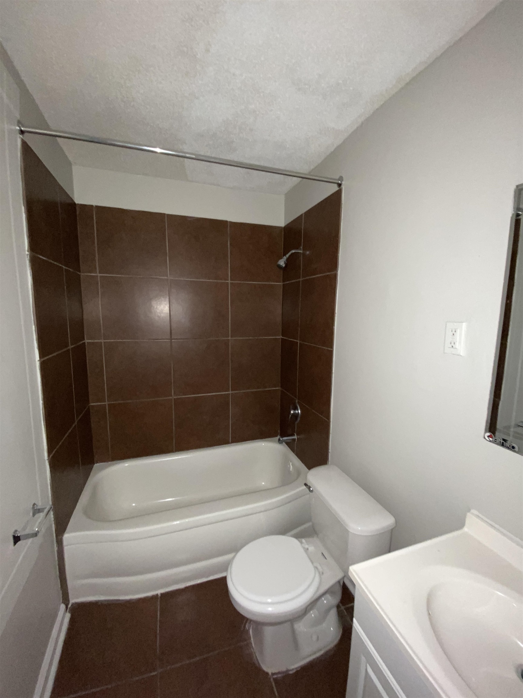 5462 Haleville Road Memphis, TN 38116 - Photo 5 of 7 a bathroom with a shower a toilet and sink