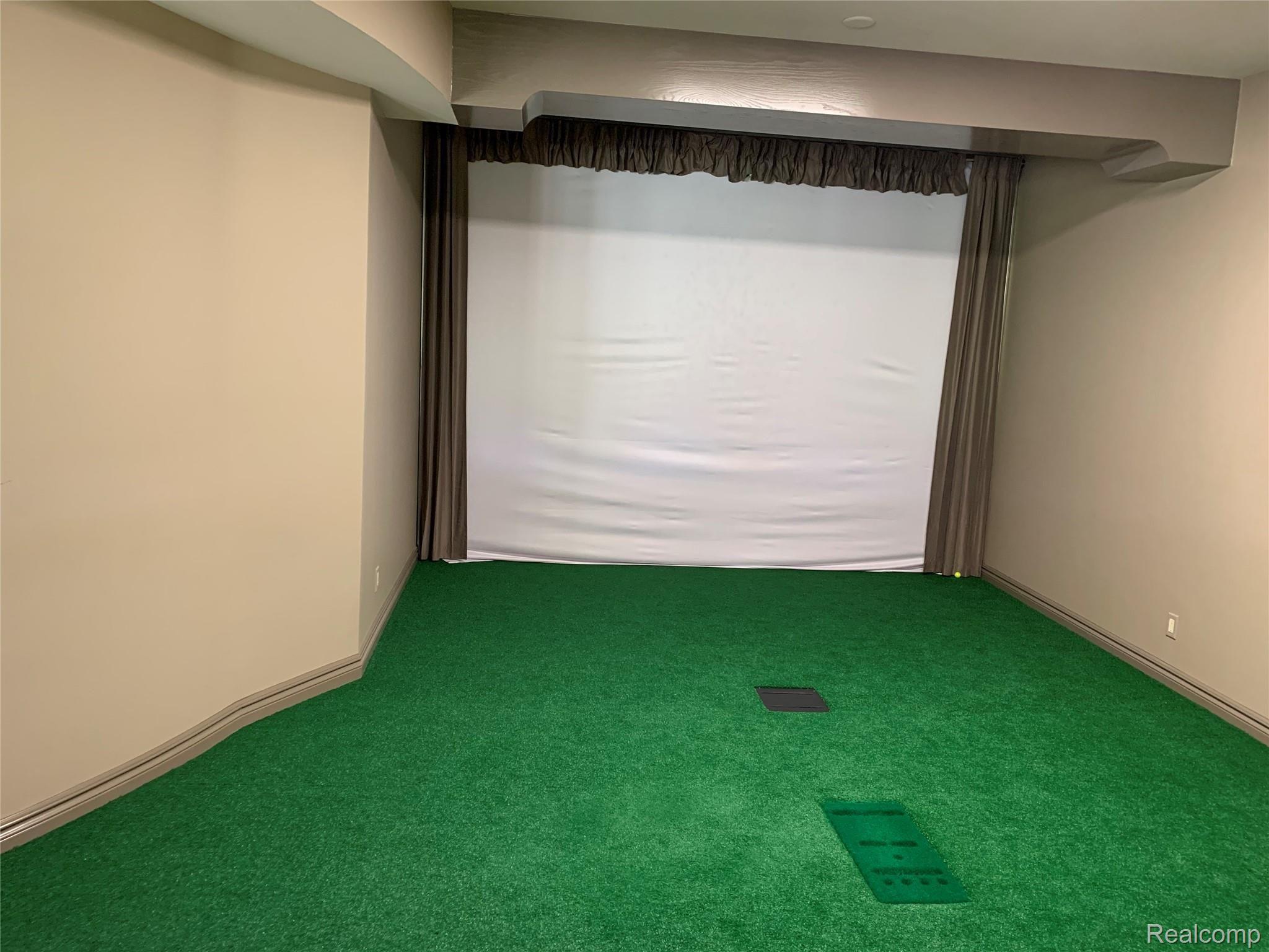 4588 Oakhurst Ridge Road Clarkston, MI 48348 - Photo 53 of 76 Lower Level Golf Simulator Space.jpg