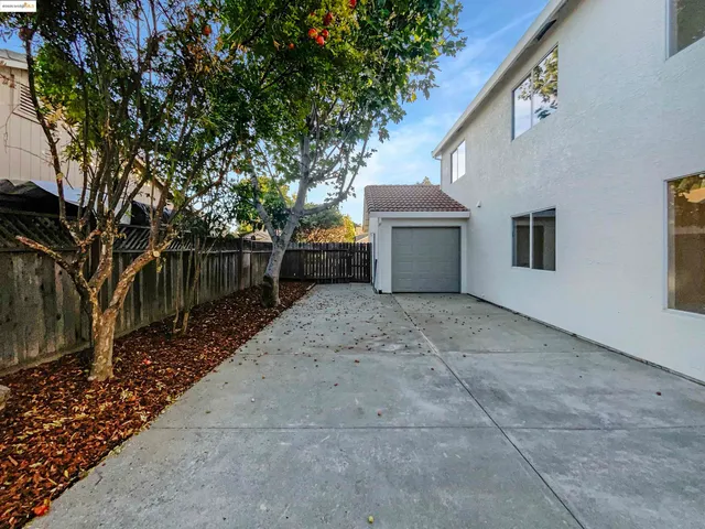 a view of a swimming pool with a lounge chairs