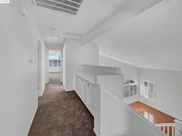 a bathroom with a sink toilet vanity and shower