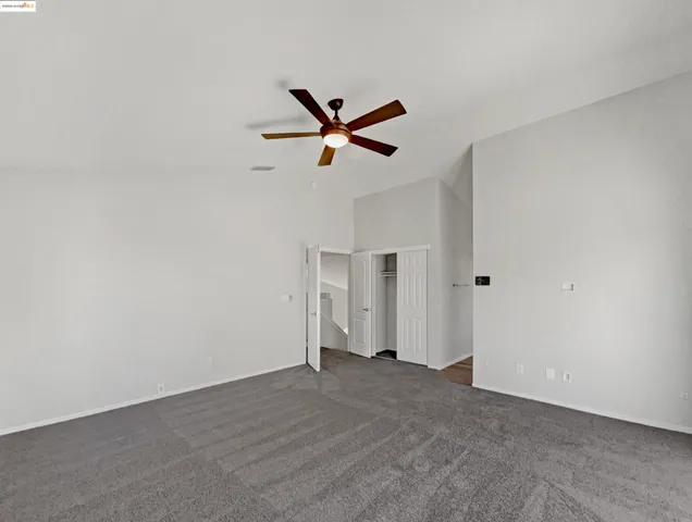 a bathroom with a bathtub sink and mirror