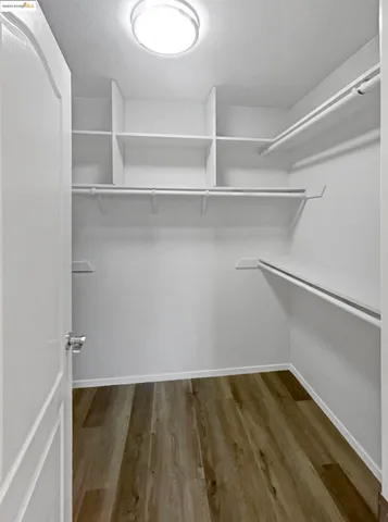 a view of balcony with wooden floor