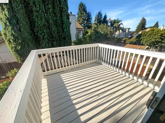 a view of a balcony with an outdoor space