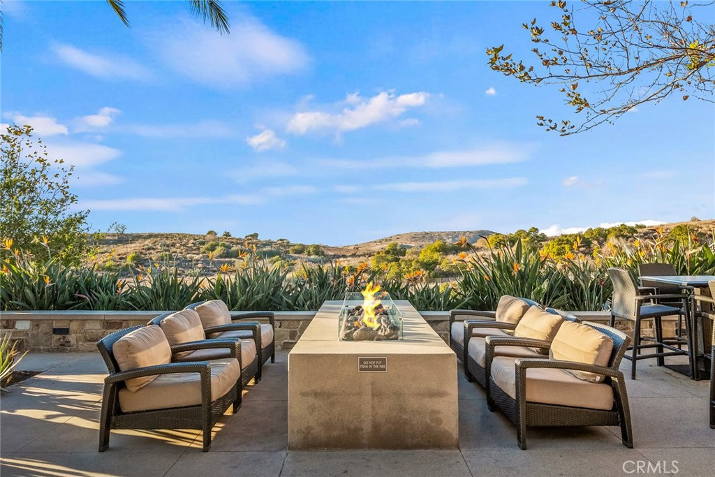 15 Jasmine Lake Forest, CA 92630 - Photo 1 of 44 a view of a patio with couches fire pit and a big yard