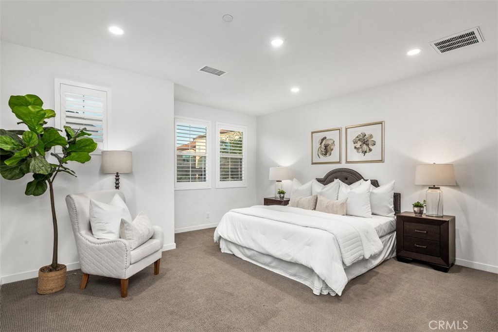 15 Jasmine Lake Forest, CA 92630 - Photo 19 of 44 a bedroom with a bed and a couch