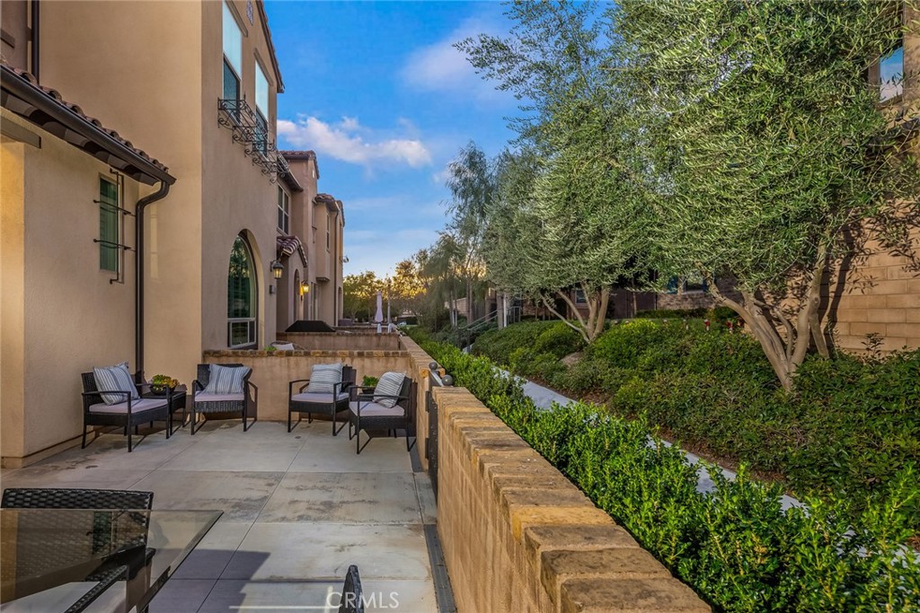 15 Jasmine Lake Forest, CA 92630 - Photo 44 of 44 a view of a patio with couches table and chairs and potted plants