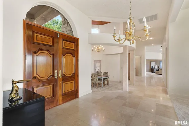 a kitchen with stainless steel appliances granite countertop a sink and cabinets