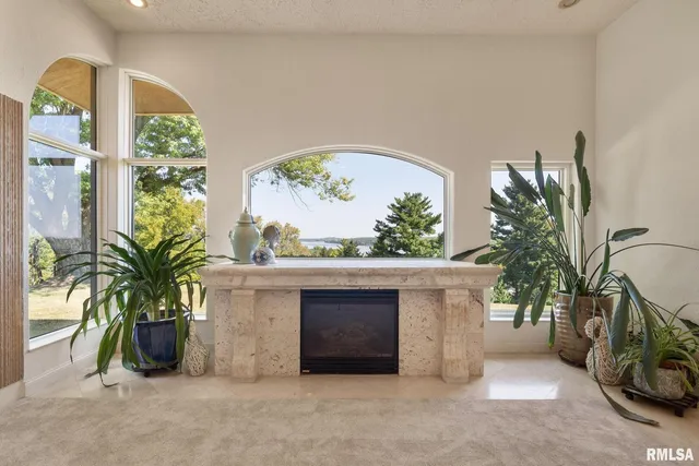 a bath tub sitting next to a window