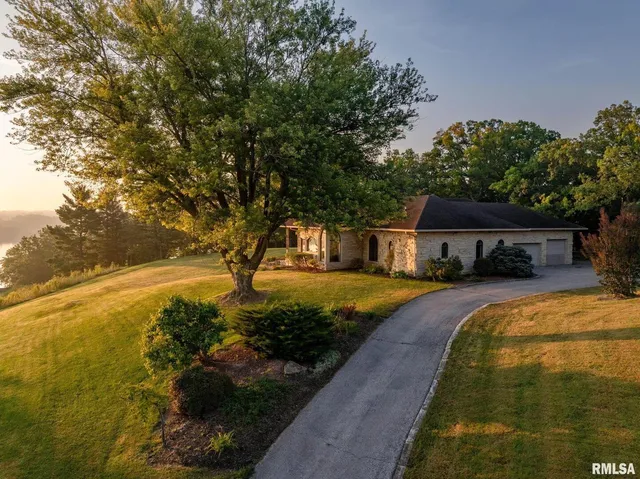 a view of a house with a big yard