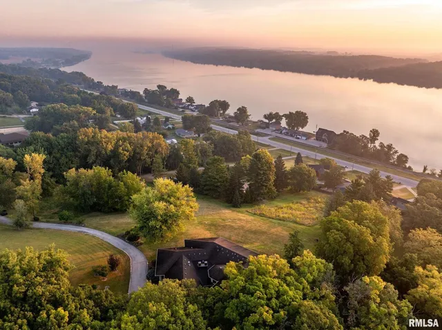 a view of a street with a yard
