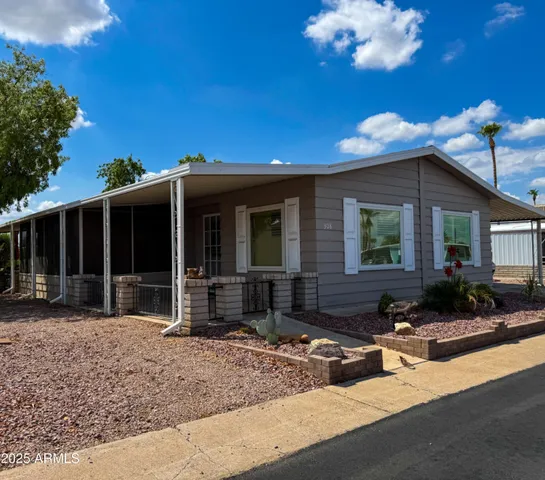 a front view of a house with patio