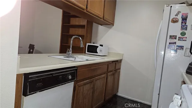 a view of a workspace with furniture