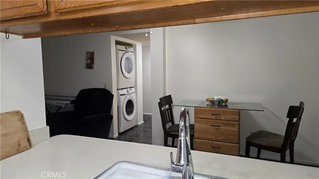 a view of a hallway and wooden floor