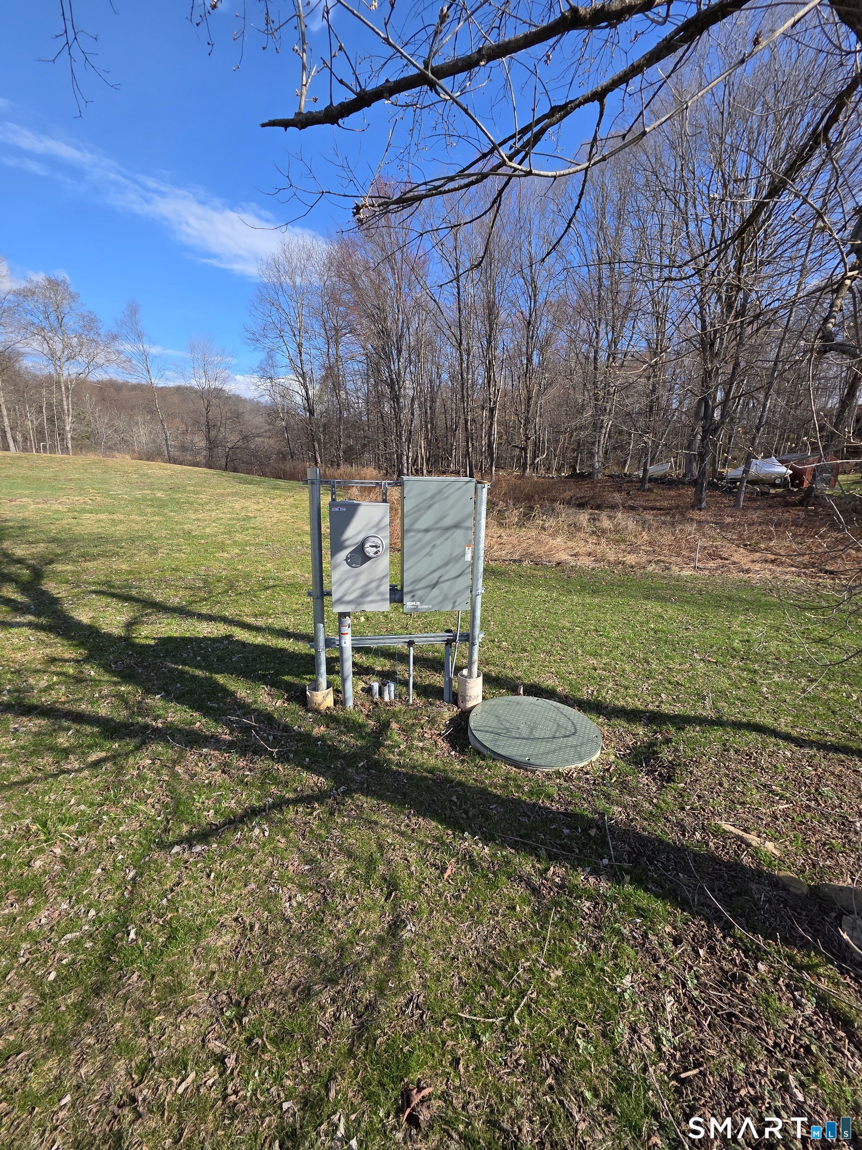 8 A Taber Road Sherman, CT 06784 - Photo 17 of 21 a view of a backyard with wooden fence