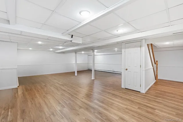 a view of a livingroom with wooden floor