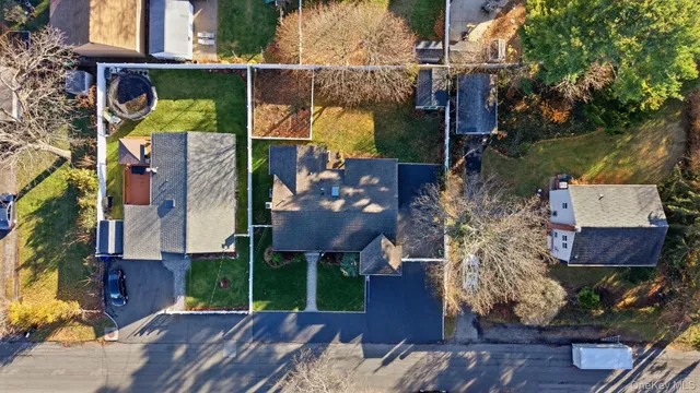 a view of multiple houses with outdoor space