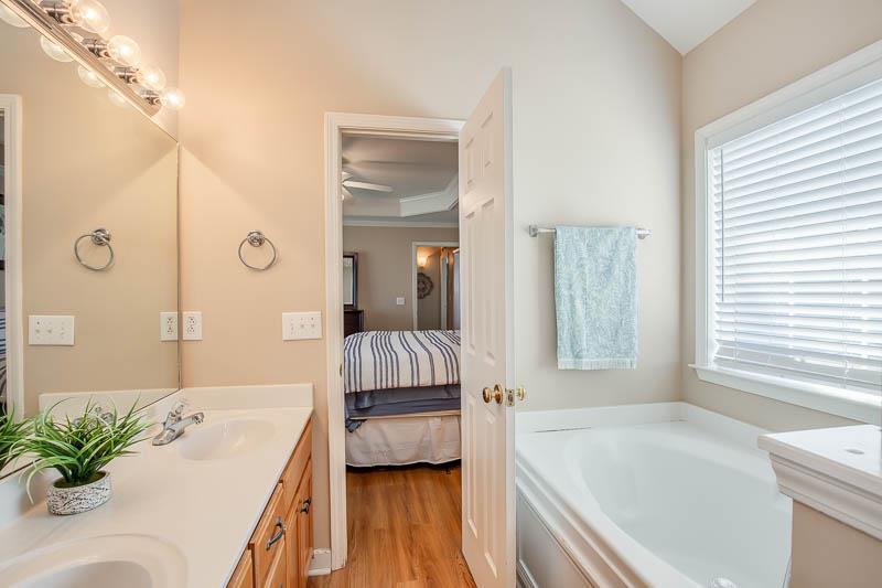 2242 Dewey Drive Spring Hill, TN 37174 - Photo 18 of 29 a en suite spacious bathroom with a tub shower and a mirror
