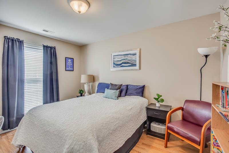 2242 Dewey Drive Spring Hill, TN 37174 - Photo 20 of 29 a bed room with a bed and chair