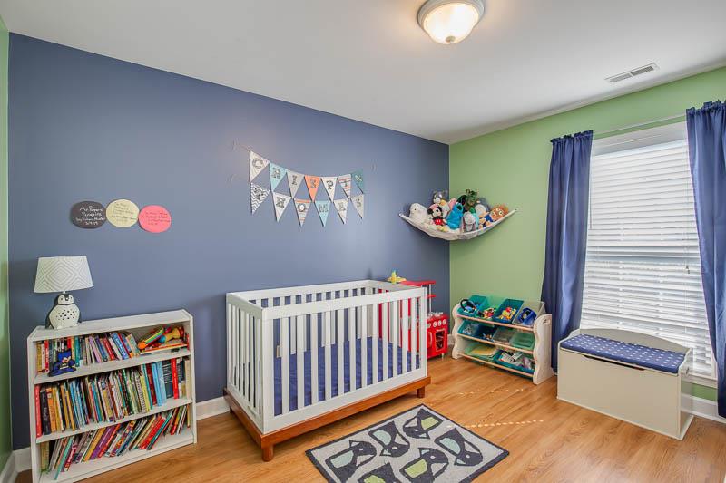 2242 Dewey Drive Spring Hill, TN 37174 - Photo 21 of 29 a bedroom with furniture and a book shelf