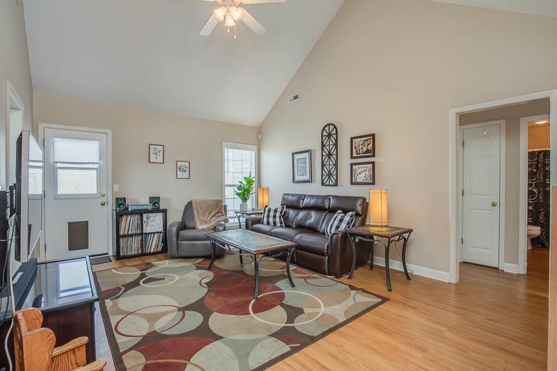 2242 Dewey Drive Spring Hill, TN 37174 - Photo 3 of 29 a living room with furniture and wooden floor