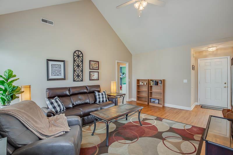2242 Dewey Drive Spring Hill, TN 37174 - Photo 4 of 29 a living room with furniture and a chandelier