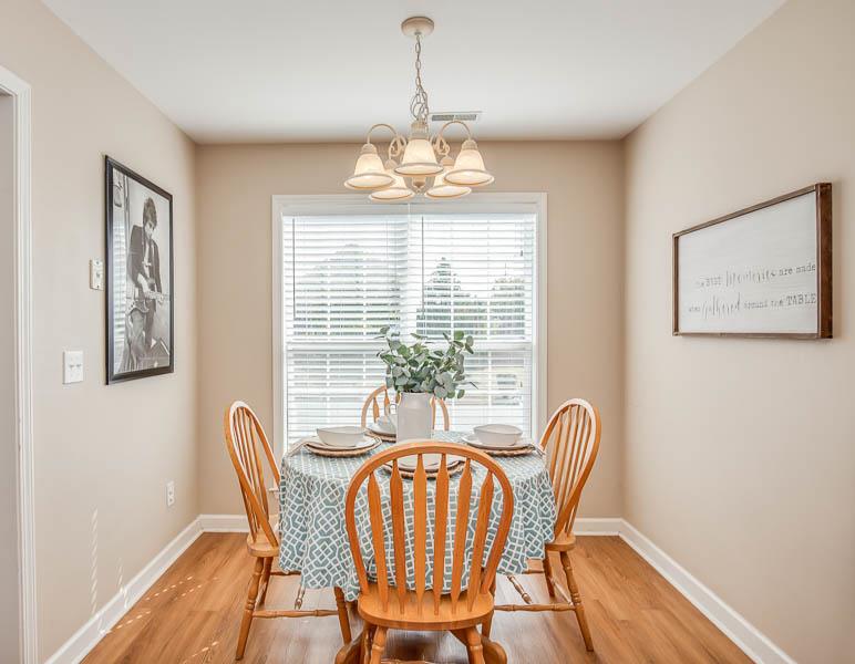 2242 Dewey Drive Spring Hill, TN 37174 - Photo 7 of 29 a view of a dining room with furniture window and wooden floor
