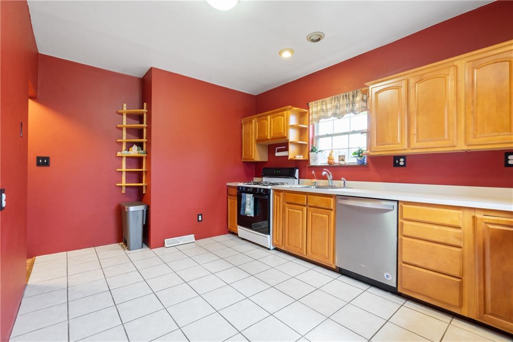 197 William Street McKees Rocks, PA 15136 - Photo 11 of 25 a kitchen that has a sink and a stove
