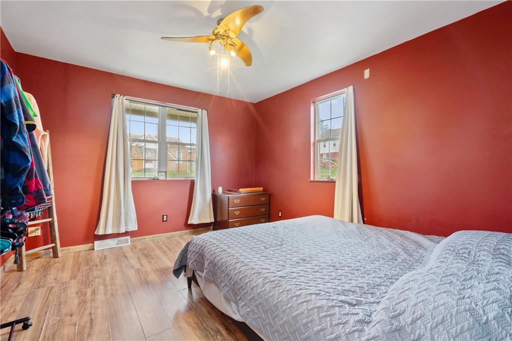 197 William Street McKees Rocks, PA 15136 - Photo 15 of 25 a bedroom with bed and wooden floor