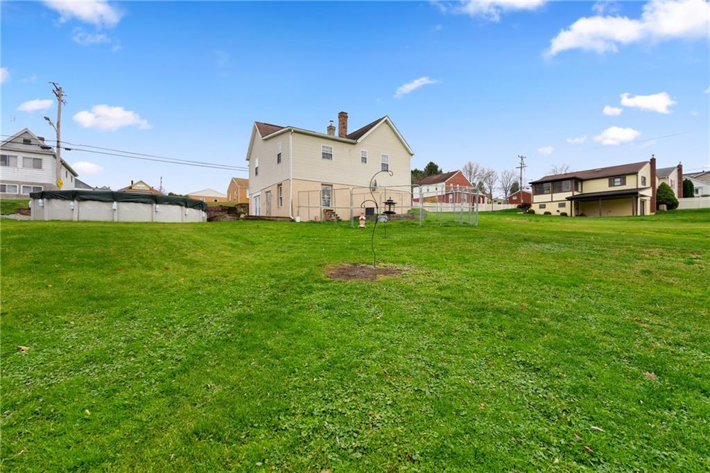 197 William Street McKees Rocks, PA 15136 - Photo 4 of 25 a front view of a house with garden