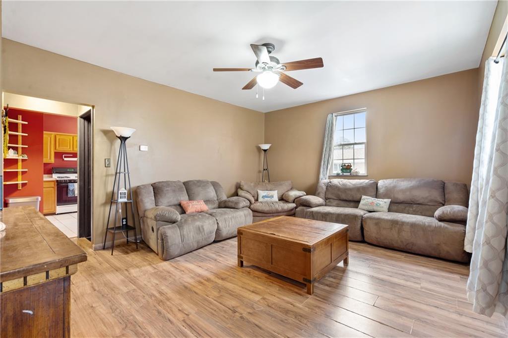 197 William Street McKees Rocks, PA 15136 - Photo 6 of 25 a living room with furniture and a large window