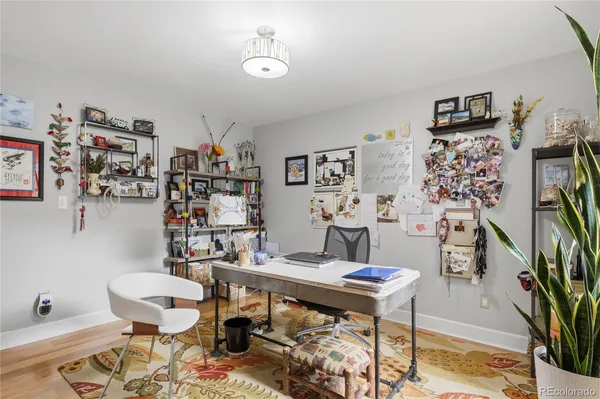 a workspace with furniture and rug