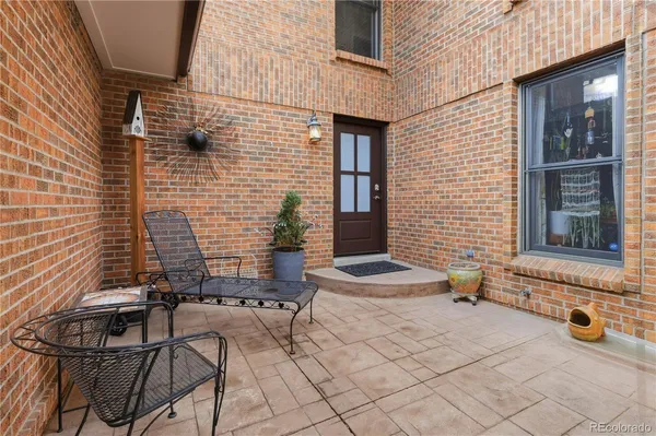 a view of house with outdoor seating