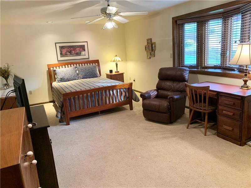 3241 Ridgeway Road Greensburg, PA 15601 - Photo 12 of 25 Generously sized master bedroom with neutrally painted walls and flooring. Double closets and a sitting area along with an on suite full bath.