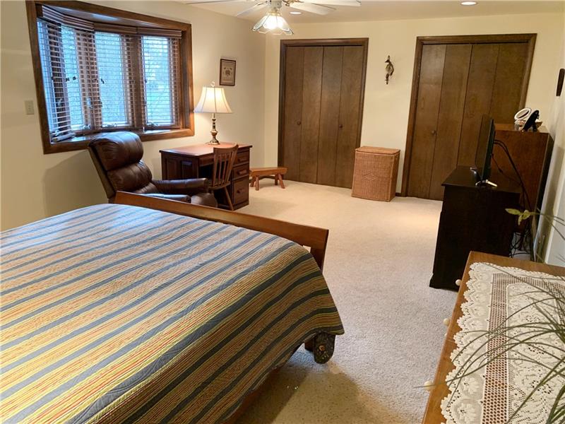 3241 Ridgeway Road Greensburg, PA 15601 - Photo 13 of 25 Master bedroom with a sitting area, double closets, neutrally painted walls and flooring and an on suite full bath.